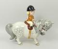 A Beswick figure of a learner rider on horse, marked Norman Thelwell 1971, and John Beswick, 11cm.