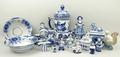 A quantity of Russian Gzhel blue and white porcelain, comprising; seven figures, monkey, a flagon, m... 