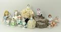 A quantity of porcelain pin cushion dolls, early 20th century, including Gainsborough ladies, Dutch ... 