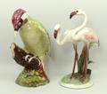A Beswick figure of a woodpecker, 22cm high, and a Wien Keramis figure of a pair of flamingos, base ... 