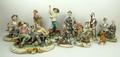 A quantity of Capodimonte porcelain figures, comprising; a fisherman, hound, rag and bone man, two t... 