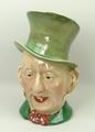 A Beswick pottery character jug modelled as Micawber, no 310, the handle marked 'Title Deeds', 23cm ... 