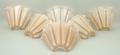 A set of six Art Deco pink glass up-lighter fluted wall light shades, 25 by 15cm.