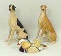 A Border Fine Arts Dogs Galore figure of Greyhound DG30 in black and white, and another DG30C in tan... 