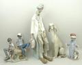 A group of Lladro porcelain figures, comprising; an Afghan hound, 30cm high, melancholy clown, 47cm ... 