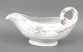 A Worcester, First Period, porcelain cos leaf sauce boat, circa 1760, painted with floral sprays and... 