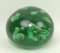 A Victorian green glass dump with air bubble inclusions, 13cm diameter.