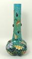 A Moser turquoise glass vase, late 19th century, of long necked, lobed form, enamel decorated with a... 