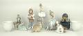 A group of Lladro porcelain figures, comprising; Pensive Eskimo Girl, no 12158, Little Friends 06129... 