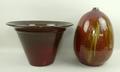 A Poole pottery pot, by Alan White, exterior red ground, interior brown ground, 37 by 24cm, and a ru... 