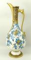 A Royal Worcester porcelain ewer, circa 1874, of baluster form decorated in the aesthetic style with... 