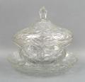An Irish glass box, cover and stand, mid 19th century, of oval form, 23 by 21cm.