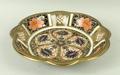 A Royal Crown Derby porcelain dish imari of lobed, circular form decorated in the 'Old Imari Japan' ... 
