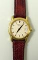 A Raymond Weil lady's 18ct gold plated cased wristwatch, the cream dial bearing baton numerals and d... 