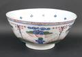 An English polychrome Delftware bowl, late 18th century, painted with a repeating band of stylised f... 