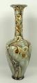 A Doulton Lambeth stoneware vase, late 19th century, of slender necked, tapering form, decorated wit... 
