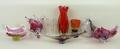 A quantity of Murano and other coloured glass including a goblet, signed, and a glass chicken, toget... 