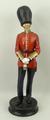 A Michael Sutty porcelain figure modelled as a Grenadier Guard, raised on a circular base, no 30, la... 