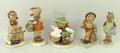 A group of Hummel figures, comprising; 'Playmates', 'Be Patient', 'Little Shopper', 'Merry Wanderer'... 
