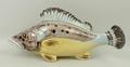 An early 20th century stone glazed wall pocket in the form of a fish, 12 by 23cm.
