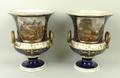 A pair of Bloor Derby vases, circa 1810, of campana form, painted with landscape vistas; View of Wor... 