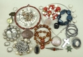 A quantity of gold, silver and costume jewellery including earrings, rings, bracelets and beads.