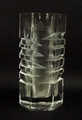 A contemporary glass vase by Ian Robson, the hexagonal body cut with angular splices, signed and dat... 