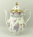 A Johann Seltman porcelain part coffee service of pear form decorated with festoons of roses, gilt h... 