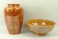 An Ruskin orange lustre vase of shouldered, tapering form, 21cm high, and a similar Ruskin lustre bo... 