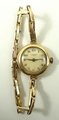 A 9ct gold lady's wristwatch by J.W.Benson Ltd, London, circular dial bearing Arabic numerals, on a ... 
