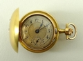 A lady's 18ct gold and diamond set, keyless wind, hunting cased pocket watch, engine turned dial bea... 