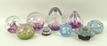 A group of Scottish glass paperweights, comprising Caithness 'Myriad', limited edition 'Quorum', and... 