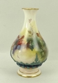A Hadley's Worcester porcelain vase, of baluster form with a quatrefoil rim, painted with Autumn fru... 