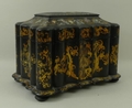 A Victorian papier mache and mother of pearl inlaid tea caddy, of fluted rectangular form, with hing... 