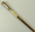 A Victorian lady's beech walking cane with a part spiral twins thorn shaft and embossed foliate scro... 