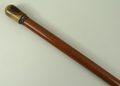 A malacca pipe stick, early 20th century, the briar wood knop unscrewing to reveal a pipe, 92.5cm lo... 