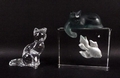 A Baccarat glass cat with acid etched mark to the base, 10cm diameter, and a Daum France paperweight... 