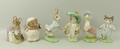 A quantity of Beswick Beatrix Potter figures, with gold or platinum accents, BP9-b, all boxed, compr... 