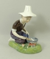 A Royal Doulton prototype figure of River Boy HN2128, painted in brown and lilac, 10cm.