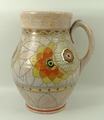 A Charlotte Rhead pottery jug of baluster form, tube line decorated in the 'Rhodian' pattern, signed... 