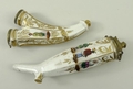A German porcelain pipe, 19th century, decorated in the manner of Herold with Eastern figures, hinge... 