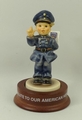 A Goebel Hummel figurine of 'Merk' Dir's Halt!', 'A Salute to our American Heroes', 'NYC Police Foun... 