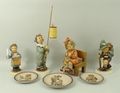 A collection of Goebel Hummel figurines comprising 'To Keep You Warm', no 049, HUM 759, 'Parade of L... 