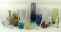A quantity of modern studio and collectable glassware comprising a Nachmann fluted clear glass vase,... 