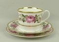 A Royal Worcester porcelain part tea service decorated in the 'Royal Garden' pattern, comprising cak... 