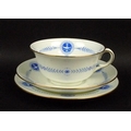 A Wedgwood part tea service, gilded blue transfer on a white ground, comprising milk jug, two cake p... 