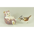 A Royal Crown Derby paperweight, modelled as a tiger cub in Imari colours, marked LVI, 8cm, and a Co... 