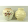 A Wedgwood 1950's cream coloured vase, of bulbous ridged form, impressed to base 'Of Etruria & Barla... 