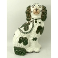 An early 19th century Staffordshire flatback of a King Charles spaniel, with lustre dark green ears ... 