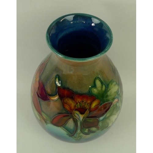 3 - A Moorcroft vase, early 20th century, of weighted baluster form, decorated with fuchsias, with impre... 